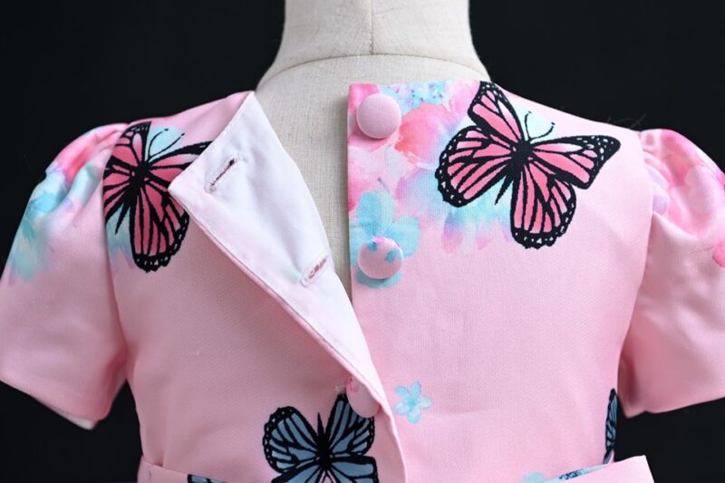Enchanting Pink Floral And Butterfly Party Dress With Matching Bow - Image 3